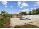 Enjoy a private outdoor oasis with a refreshing in-ground pool and brick patio, perfect for relaxing and entertaining at 1410 Moss Laden Ct, Brandon, FL 33511
