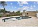 Backyard pool area with brick pavers and a view of the home's exterior at 1410 Moss Laden Ct, Brandon, FL 33511