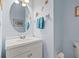 Charming powder room with coastal decor at 17527 Stinchar Dr, Land O Lakes, FL 34638