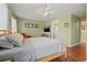 Light-filled bedroom with hardwood flooring at 17527 Stinchar Dr, Land O Lakes, FL 34638