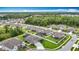A Primary-planned community with green spaces, ponds, and modern homes at 18079 Romanesque Ct, Spring Hill, FL 34610