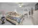 This bedroom features a ceiling fan and closet, offering a cozy and functional space at 184 Hunter Ct, Palm Harbor, FL 34684