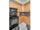 Close up of modern kitchen with granite countertops and updated appliances at 184 Hunter Ct, Palm Harbor, FL 34684