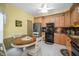 Eat-in kitchen featuring stainless steel appliances and granite countertops at 184 Hunter Ct, Palm Harbor, FL 34684