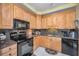 Modern kitchen with granite countertops and updated appliances at 184 Hunter Ct, Palm Harbor, FL 34684