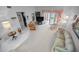 Bright living room featuring tile floor, large windows and comfortable seating at 184 Hunter Ct, Palm Harbor, FL 34684