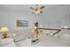 Open loft space with a neutral color scheme and view of the staircase below at 184 Hunter Ct, Palm Harbor, FL 34684