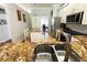 Well-lit kitchen boasts granite counters, stainless appliances and double basin sink at 1842 Ridgelake Ct, Wesley Chapel, FL 33543