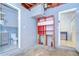 Garage leads to a bathroom and bonus room, maximizing utility at 2051 Indigo Dr, Clearwater, FL 33763