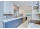 Modern kitchen featuring stylish backsplash, sleek countertops, and modern stainless appliances at 2051 Indigo Dr, Clearwater, FL 33763