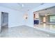 Open-concept living area with seamless transition to the updated kitchen and dining space at 2051 Indigo Dr, Clearwater, FL 33763