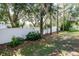 Backyard with lawn and vinyl fence at 2316 Lake Woodberry Cir, Brandon, FL 33510