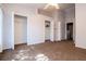 Bedroom featuring spacious closets, neutral carpet, and view to a bathroom at 2316 Lake Woodberry Cir, Brandon, FL 33510