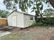 Exterior view of a small storage shed in backyard at 2523 Krueger Lane, Tampa, FL 33618