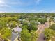 Charming neighborhood featuring mature trees, brick streets, and cozy homes under a vast, blue sky at 2808 N Highland Ave, Tampa, FL 33602