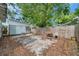 Spacious backyard featuring a mix of concrete slab and patio space with a privacy fence at 2808 N Highland Ave, Tampa, FL 33602