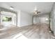 Bright and airy living room with modern floors and unique stone archways at 2808 N Highland Ave, Tampa, FL 33602