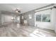 Inviting living room featuring stone accent walls, fireplace, and modern flooring at 2808 N Highland Ave, Tampa, FL 33602