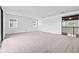 Spacious bedroom, flooded with natural light, featuring high ceilings and stylish modern design at 28565 Picana Ln, Wesley Chapel, FL 33543