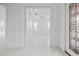 Bright living area with marble floors and ample natural light at 28565 Picana Ln, Wesley Chapel, FL 33543