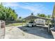 Carport with attached shed at 3008 E Wilder Ave, Tampa, FL 33610