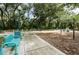 Park with benches and swings offer residents a comfortable space for relaxation and socializing at 3089 Ashland Ter, Clearwater, FL 33761