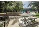 Park picnic tables and grill provide a perfect spot for families to gather at 3089 Ashland Ter, Clearwater, FL 33761