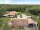 Aerial view of the property showing the main house and surrounding land at 309 Hidden Lake Dr, Brandon, FL 33511