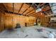 Spacious garage featuring an overhead door, work bench, and ample room for storage at 309 Hidden Lake Dr, Brandon, FL 33511
