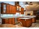 A beautiful open kitchen with custom wood cabinets and stainless steel appliances at 309 Hidden Lake Dr, Brandon, FL 33511