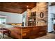 Unique living space features wood paneled accents and an exposed brick wall at 309 Hidden Lake Dr, Brandon, FL 33511