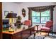 Well-appointed office with a large desk, comfortable seating, and a window with natural light at 309 Hidden Lake Dr, Brandon, FL 33511