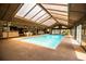 Bright and spacious indoor pool area with a full bar and hot tub for relaxation and entertaining at 309 Hidden Lake Dr, Brandon, FL 33511