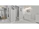 Well-lit bathroom with a sleek vanity, toilet, and neutral color palette at 3138 Deergrass Ct, Holiday, FL 34691