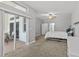 Bedroom featuring a glass sliding door leading to the backyard and neutral colored walls at 3138 Deergrass Ct, Holiday, FL 34691