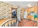 Functional kitchen featuring an open layout, with laminate floors and vintage cabinets at 3201 E Mcberry St, Tampa, FL 33610