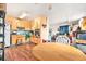 Efficient kitchen with a round wooden table and connection to the living room at 3201 E Mcberry St, Tampa, FL 33610