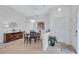 Elegant dining room featuring a round table, decorative chandelier, and stylish accents, perfect for entertaining guests at 3271 Mcmath Dr, Palm Harbor, FL 34684