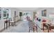 Cozy living room with stylish furniture, decorative rug, and ample natural light at 3271 Mcmath Dr, Palm Harbor, FL 34684
