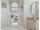 Hallway with a bedroom view through the door at 3457 Foxhall Dr, Holiday, FL 34691