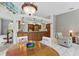 Spacious kitchen featuring ample cabinetry, granite counters, and modern appliances at 3457 Foxhall Dr, Holiday, FL 34691