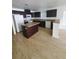 Features an island, white appliances, and dark cabinetry at 3713 N 31St St, Tampa, FL 33610