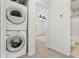 Conveniently placed stackable washer and dryer near the bedroom at 409 S Audubon Ave # 3, Tampa, FL 33609