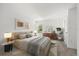 Bright bedroom featuring neutral tones, stylish decor, and cozy carpet flooring at 4206 W North B St # 1, Tampa, FL 33609