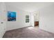Bedroom with clean walls, carpet flooring, and natural light from the window at 4206 W North B St # 1, Tampa, FL 33609