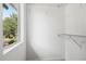 Walk-in closet with shelving and a view to the outdoors from the window at 4206 W North B St # 1, Tampa, FL 33609