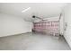 Spacious garage interior with insulated door and painted floor at 4206 W North B St # 1, Tampa, FL 33609