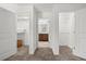 Hallway showing two closets and bathroom in between with plenty of storage space and shelving at 4206 W North B St # 1, Tampa, FL 33609