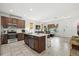Well-equipped kitchen island, stainless steel appliances, and a seamless flow into the living area at 4206 W North B St # 1, Tampa, FL 33609