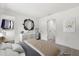 The bedroom features a dresser with decor, neutral walls, carpet flooring and open closet providing storage space at 4206 W North B St # 2, Tampa, FL 33609
